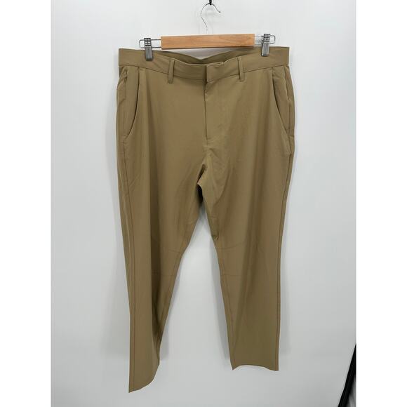 Fabletics The Only Pant Men 34x32 Khaki Tan Classic Fit NWT Golf Work Office - Picture 1 of 8
